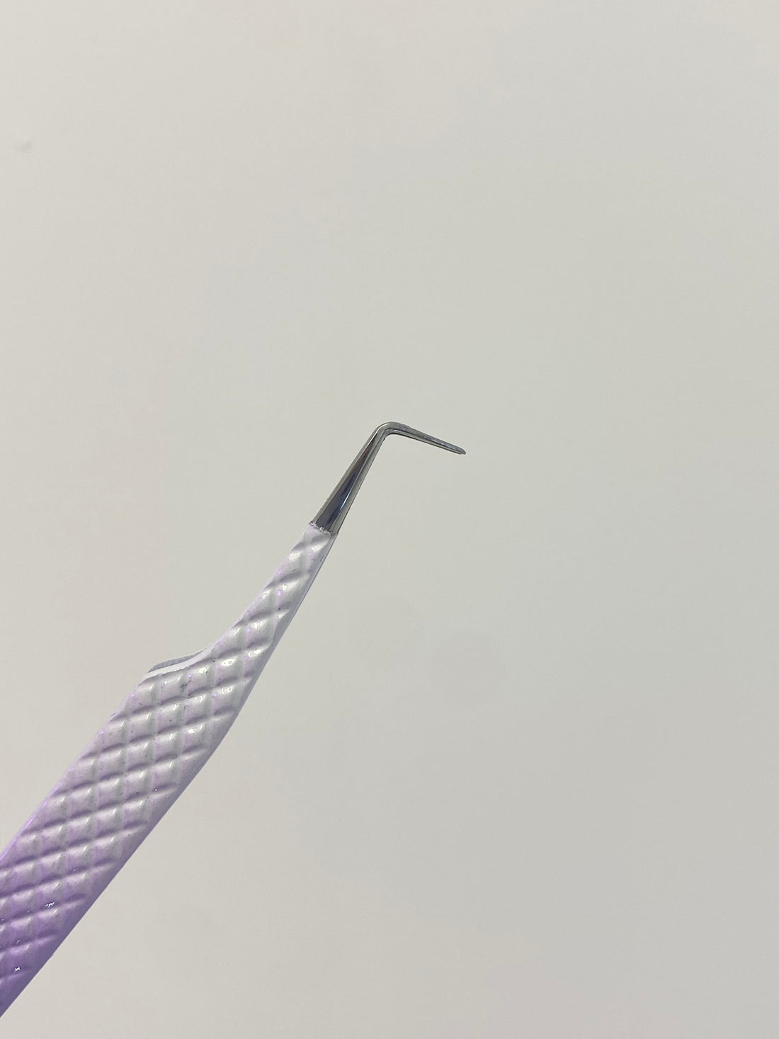 L shaped tweezer