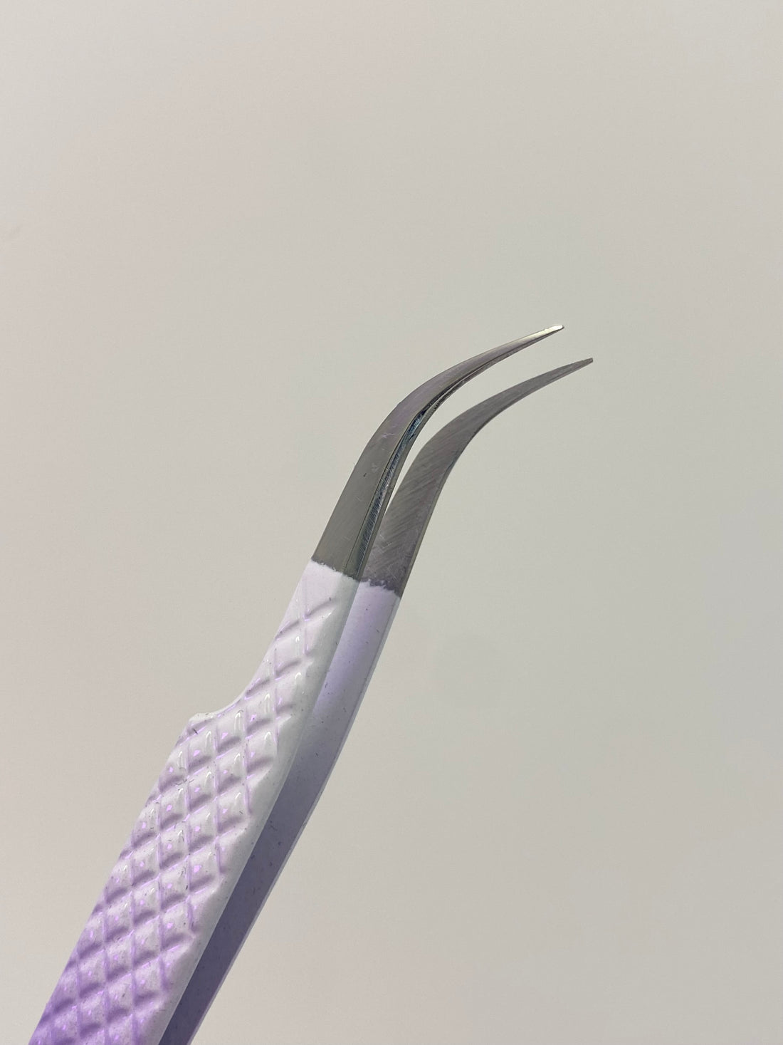 Curved Isolation Tweezer
